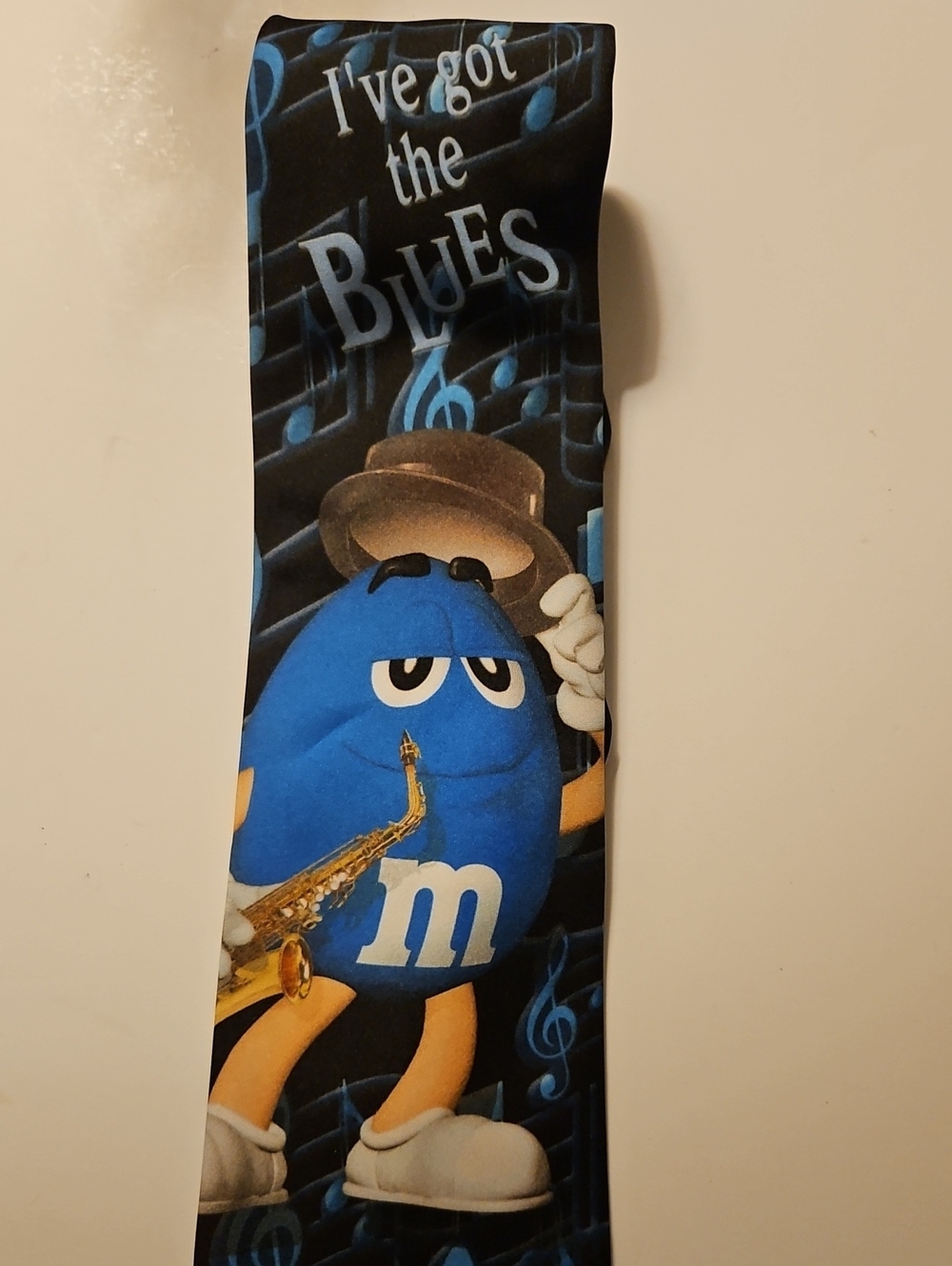 I' ve Got The Blues M&M'S Blue Character Tie with Musical Saxophone Graphic